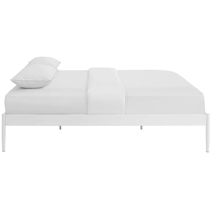 White metal platform bed frame with white bedding and two pillows, minimalist modern style.