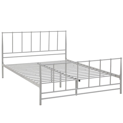 Grey metal bed frame with tall slat headboard, shorter slat footboard, and slatted base for a minimalist bedroom.
