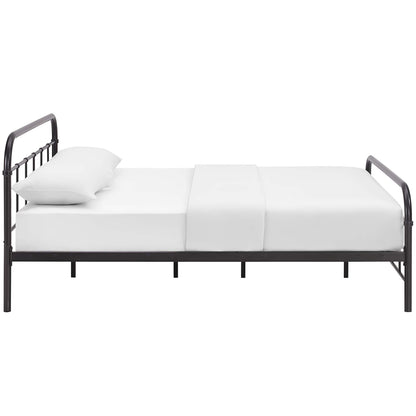 Stainless steel queen bed frame with rounded headboard and footboard, white mattress and pillow, in a modern industrial bedroom style.