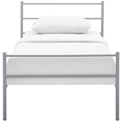Gray metal bed frame with horizontal bars, white bedding and pillow, modern minimalist design.