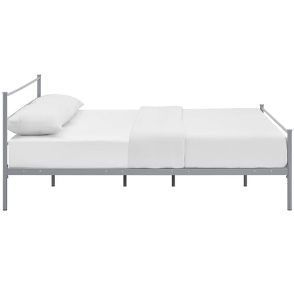 Gray metal full platform bed frame with white sheets and pillow; simple, modern design.