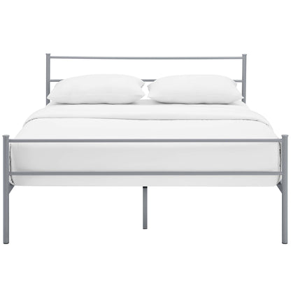 Gray metal bed frame with headboard and footboard, white bedding for a minimalist modern look.