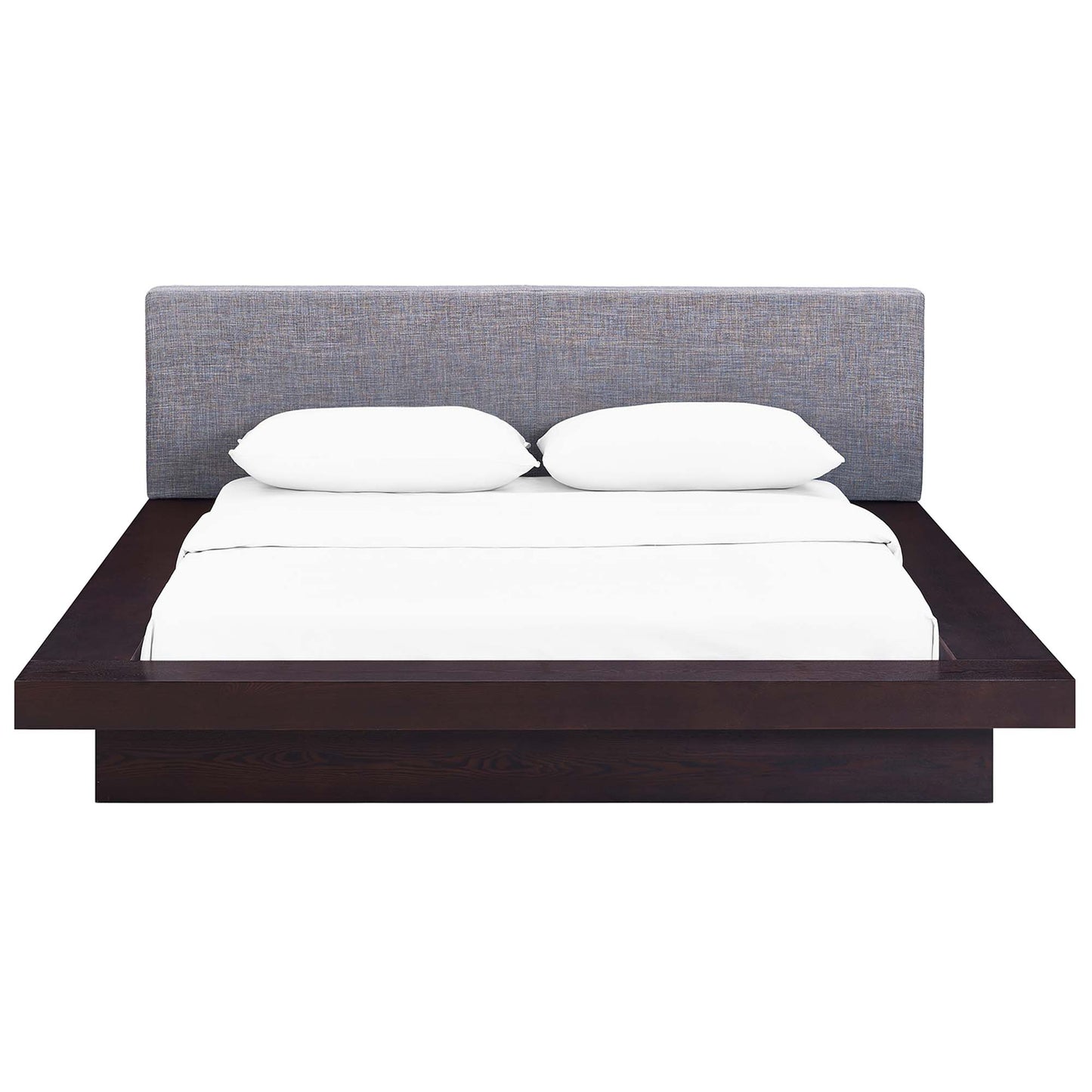 Low-profile platform bed with dark espresso wooden frame, gray fabric headboard, and white bedding with two pillows.