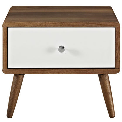 Mid-century walnut nightstand with white drawer front, metal knob, and tapered legs.