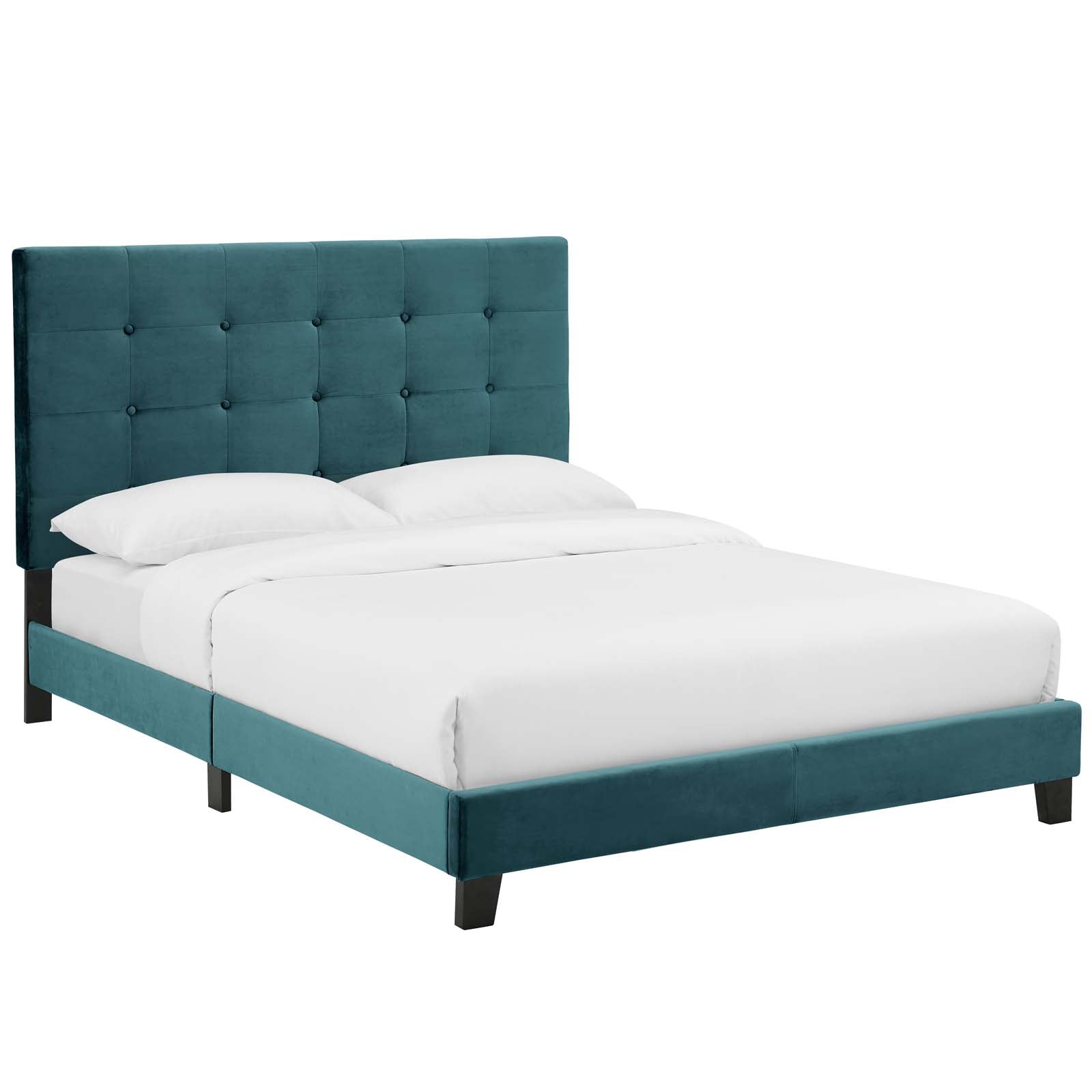 Sea blue velvet tufted button upholstered full platform bed with a tall headboard, white bedding and dark square legs.