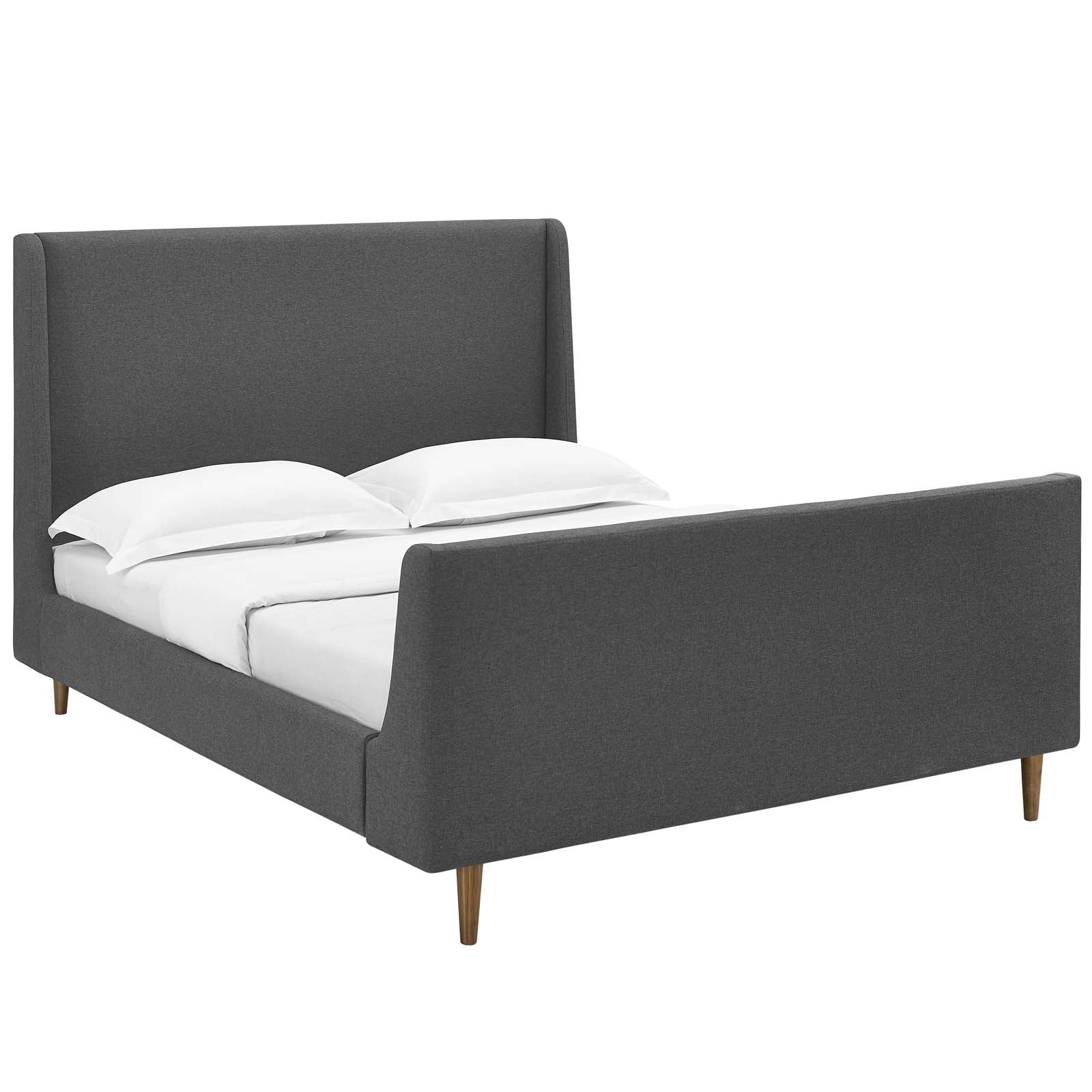 Gray upholstered bed frame with tall headboard, low footboard, tapered wooden legs, white bedding.