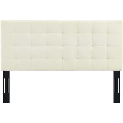 Ivory padded headboard with square tufting and black metal legs.