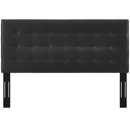 Black tufted headboard with square quilted pattern.
