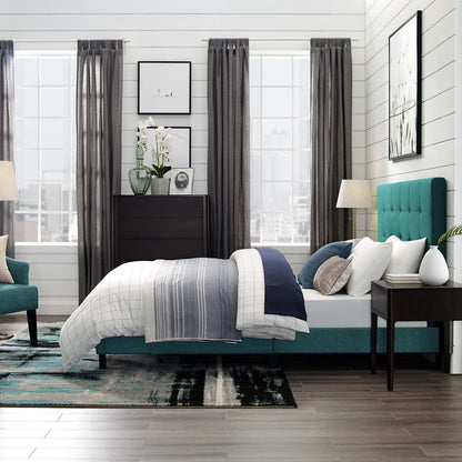Teal upholstered bed with white and blue bedding, dark wood dresser, and gray curtains in a modern bedroom.