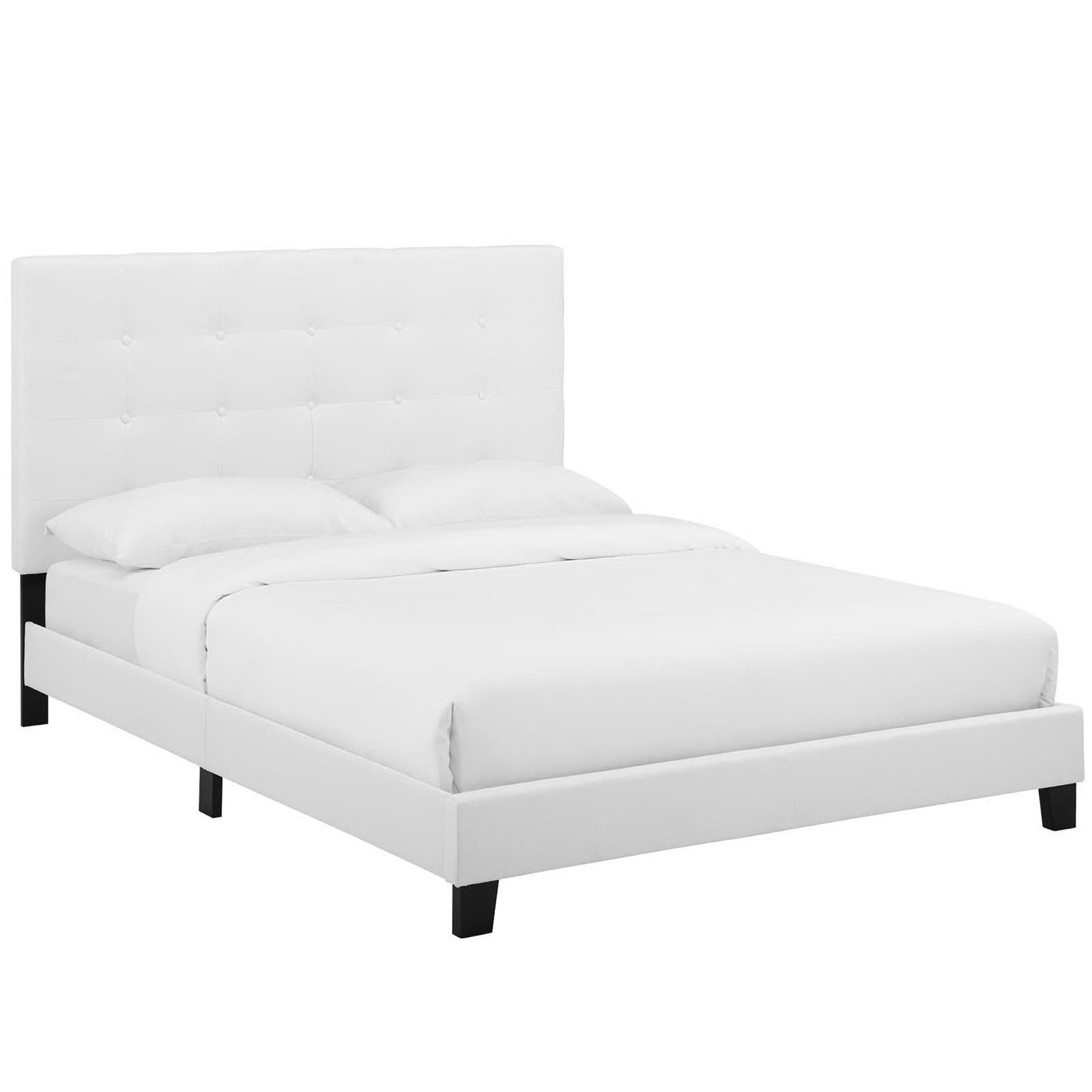 White upholstered platform bed with tufted headboard, dark legs, modern minimalist bedroom centerpiece.