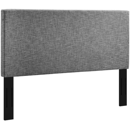 Grey fabric upholstered headboard with black legs, modern minimalist design.