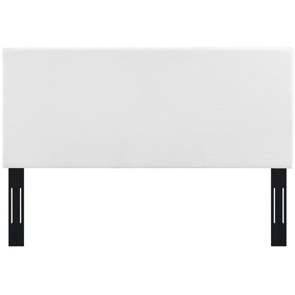 White rectangular upholstered headboard in linen fabric with vertical seams.