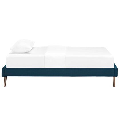 Azure fabric twin bed frame with round splayed legs, white bedding and a single white pillow, modern minimalist.