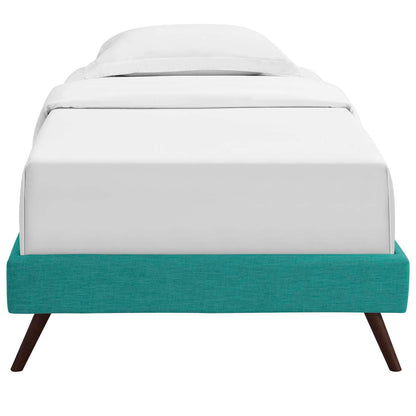 Teal fabric twin bed frame with white bedding, mid-century modern design, round splayed legs.