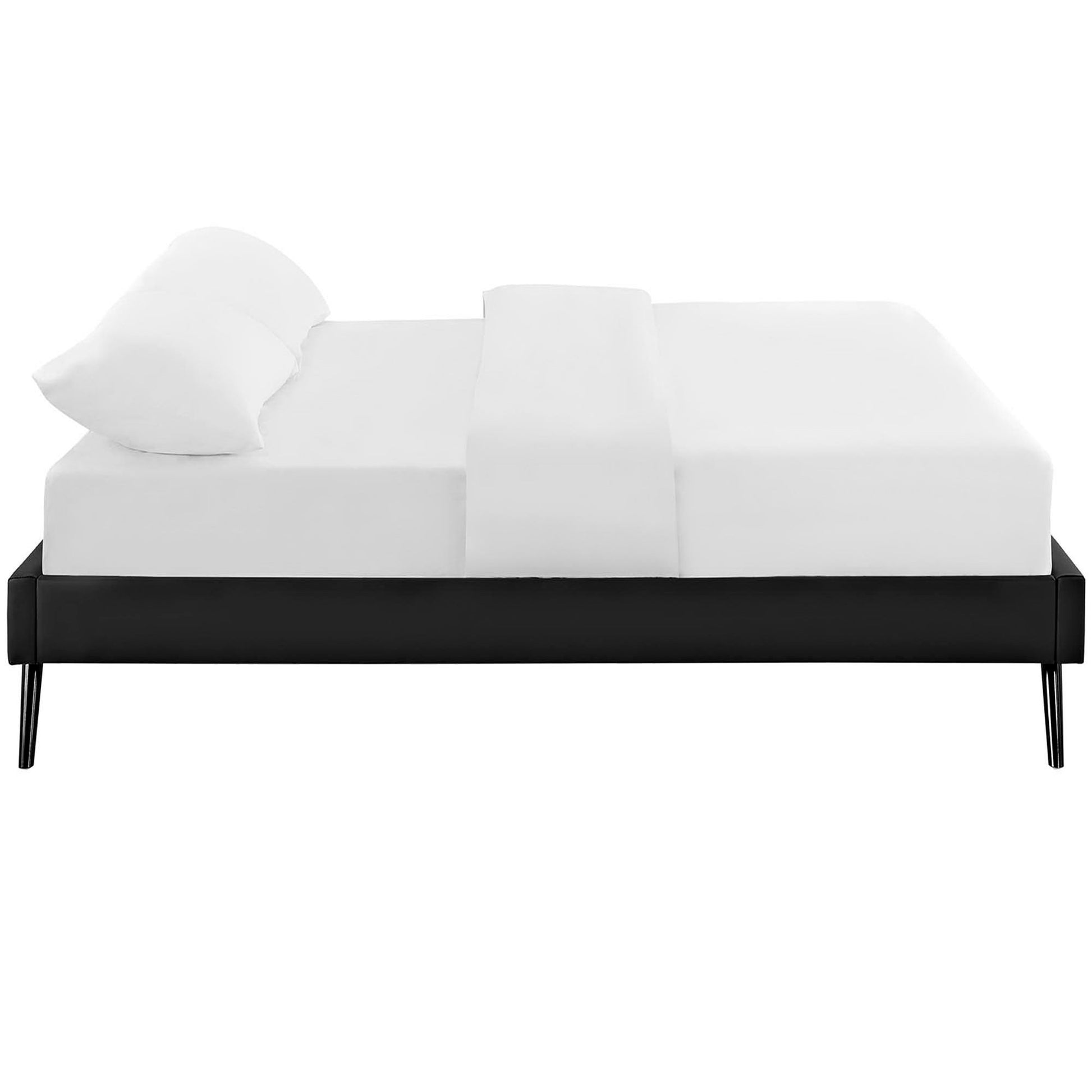 Black low-profile platform queen bed frame with white bedding and two pillows, modern minimalist design.
