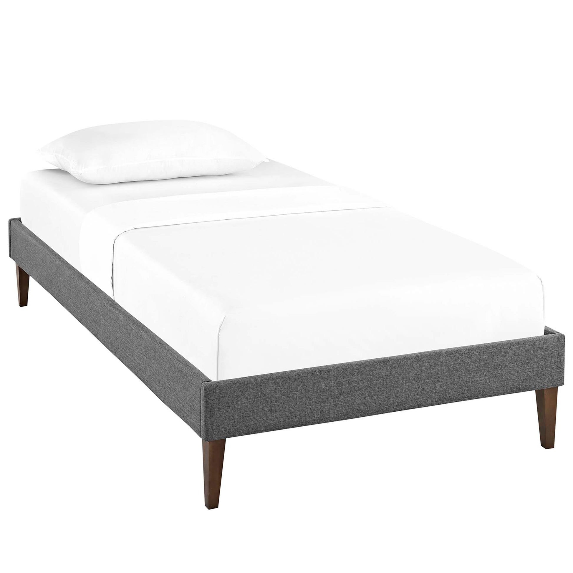 Gray upholstered twin bed frame with squared tapered legs and white bedding, modern minimalist bedroom furniture.