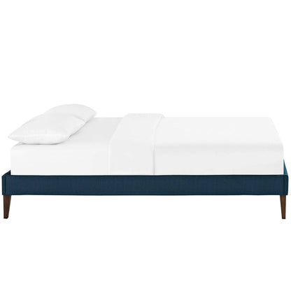 Azure fabric full bed frame with squared tapered legs, shown with white bedding for a modern, low-profile look.