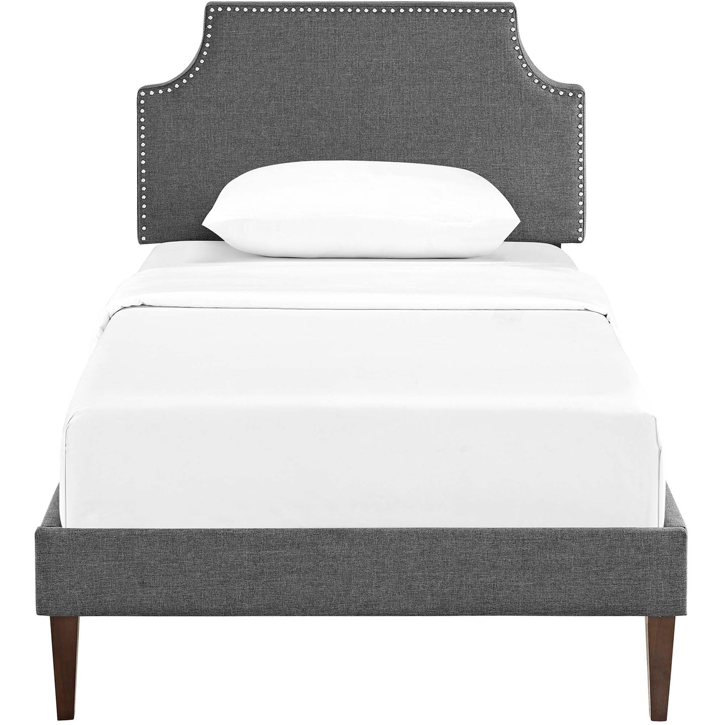 Gray fabric platform bed with squared tapered legs and white bedding.