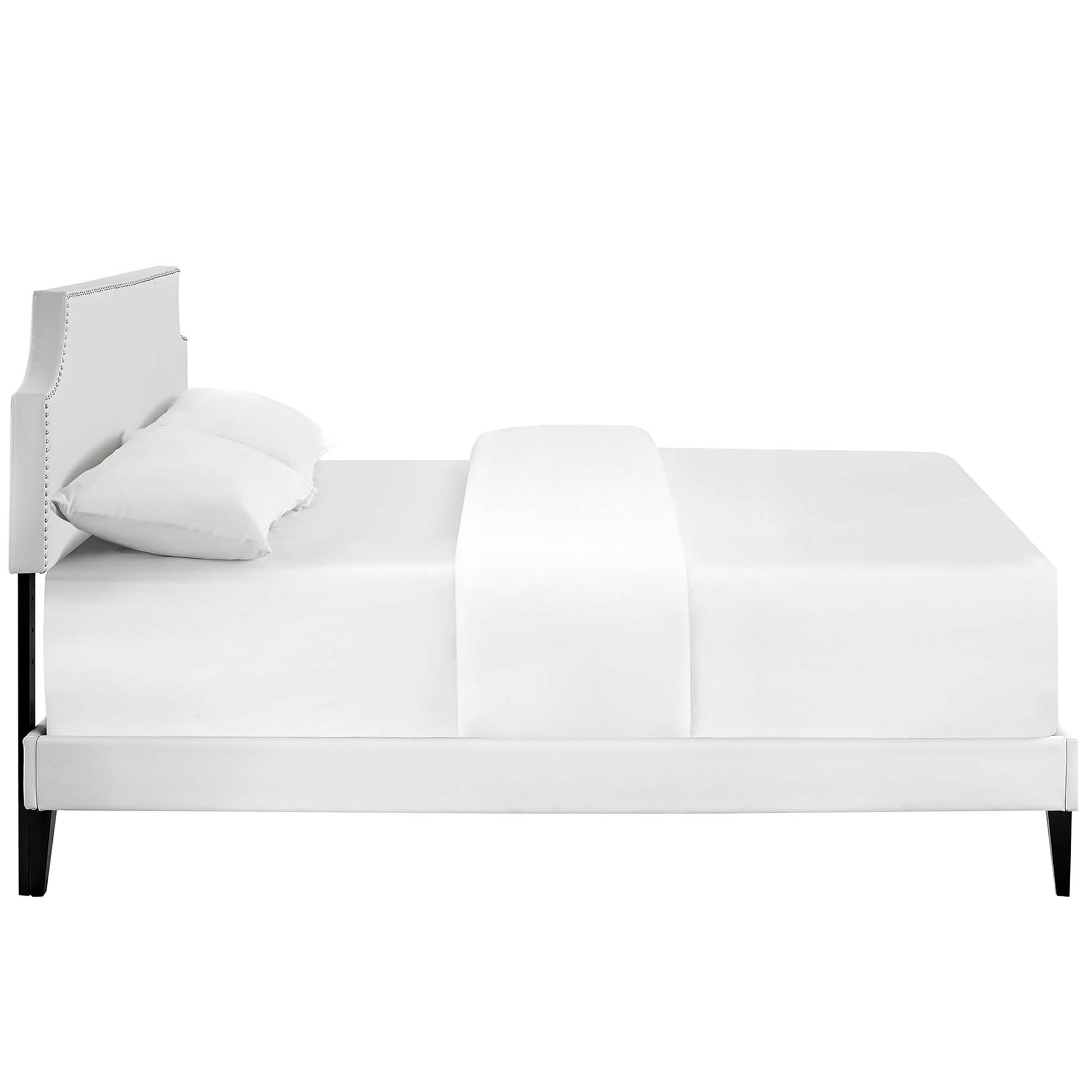 White vinyl queen platform bed with squared tapered legs and white bedding.