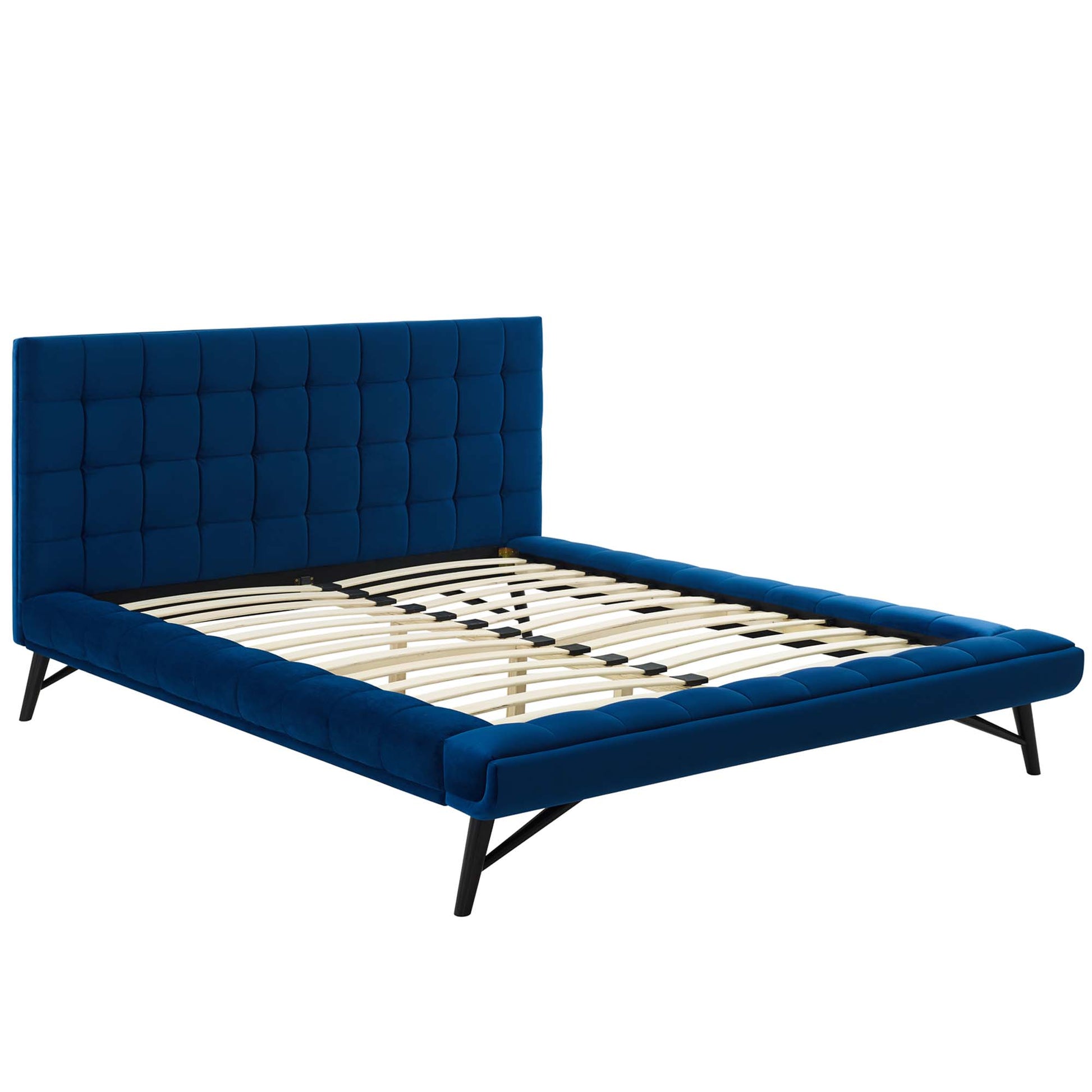 Navy blue velvet platform bed with tufted square headboard, low frame and black angled metal legs; slatted wooden base.