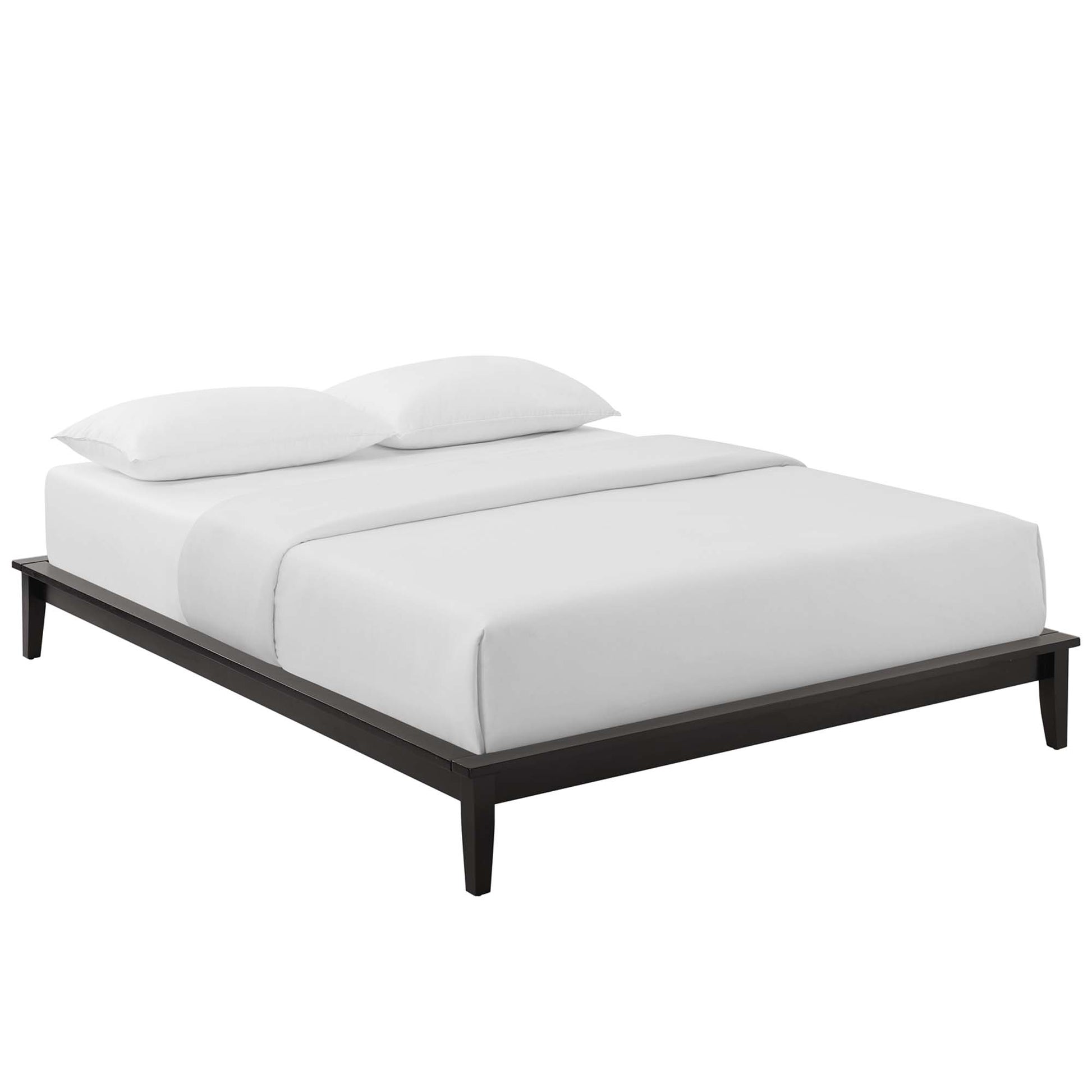 Minimalist dark wood platform bed with a low frame, tapered legs, and white bedding with two pillows.