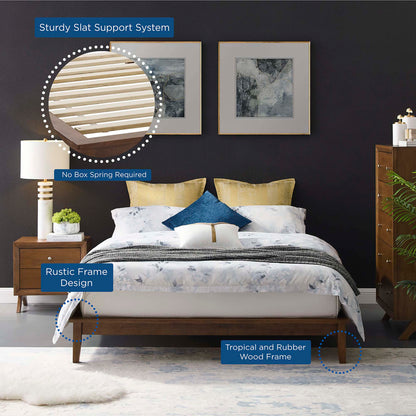 Wood queen platform bed frame in cappuccino finish with slat support; in a bedroom with floral bedding, yellow/blue pillows and framed art.