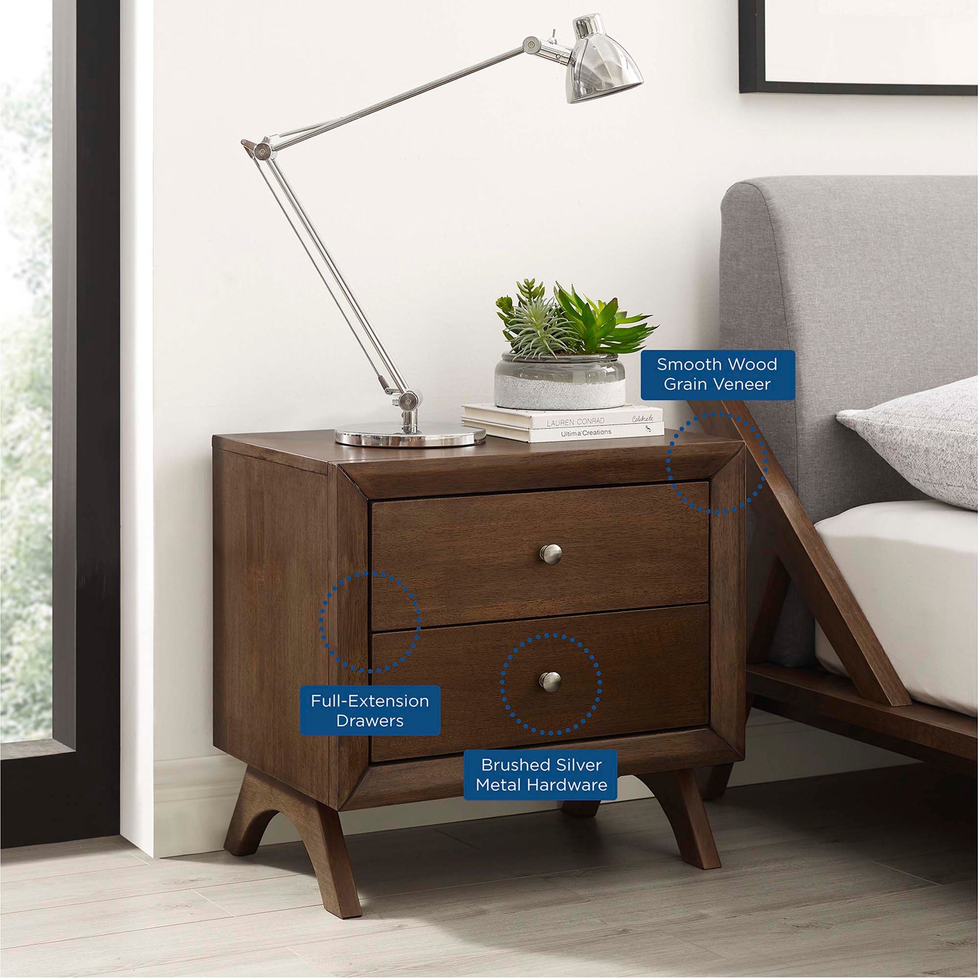 Dark wood mid-century bedside table with two full-extension drawers, brushed silver hardware, angled legs.