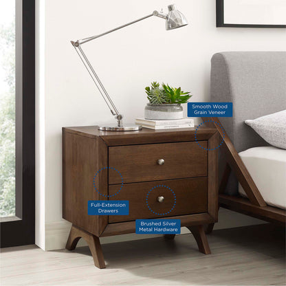 Dark wood mid-century bedside table with two full-extension drawers, brushed silver hardware, angled legs.