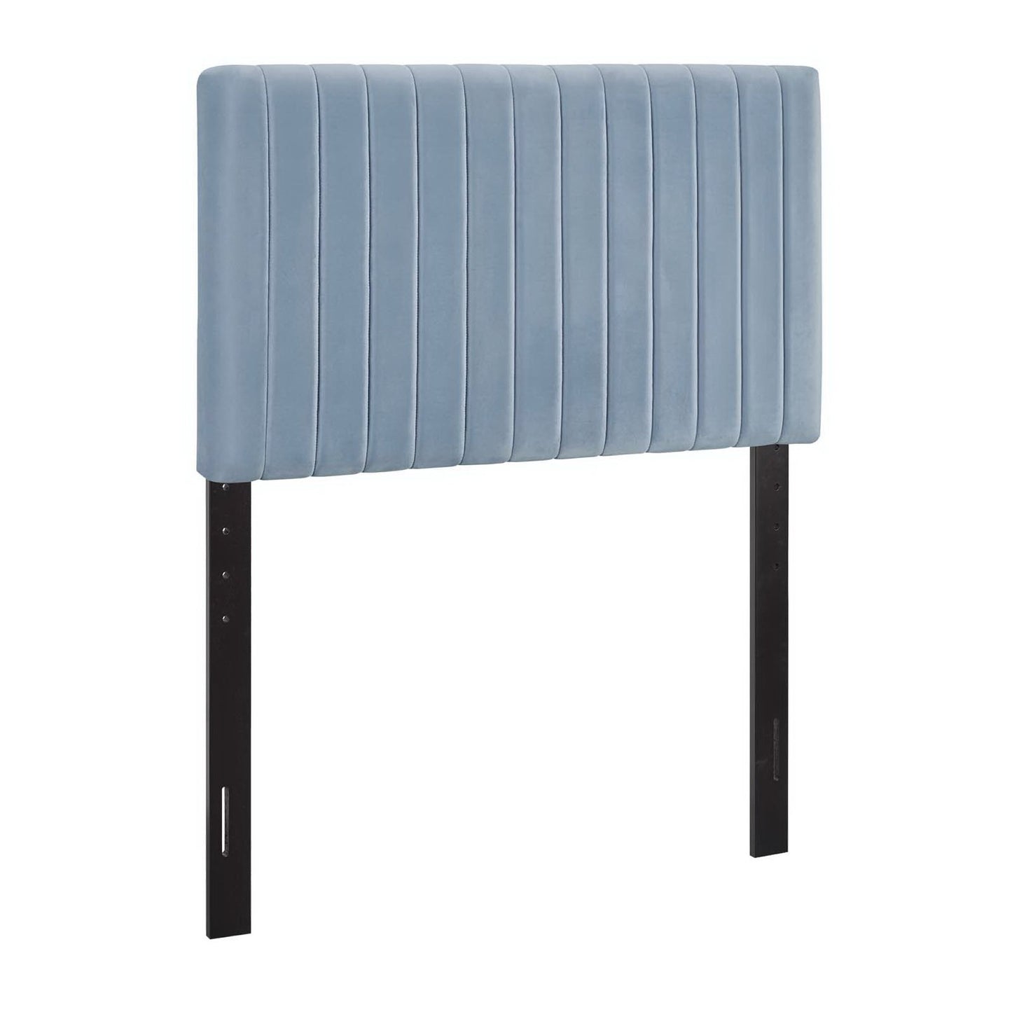 Powder blue upholstered headboard with vertical channel tufting and black metal legs.