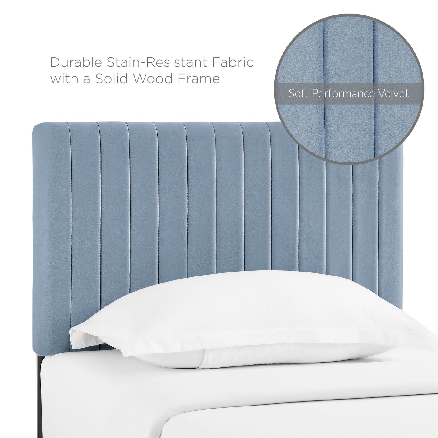 Blue vertical-channel headboard in soft performance velvet; durable stain-resistant fabric on a solid wood frame.