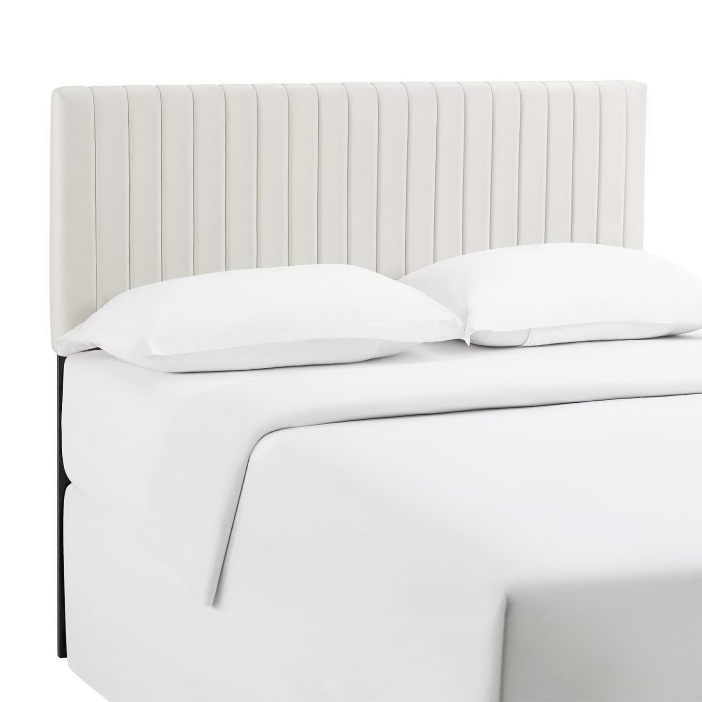 Ivory fabric upholstered headboard with tall vertical-channel panels, white bedding visible, modern minimalist style.