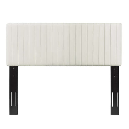 White ribbed upholstered rectangular headboard with black metal brackets for a modern bed.
