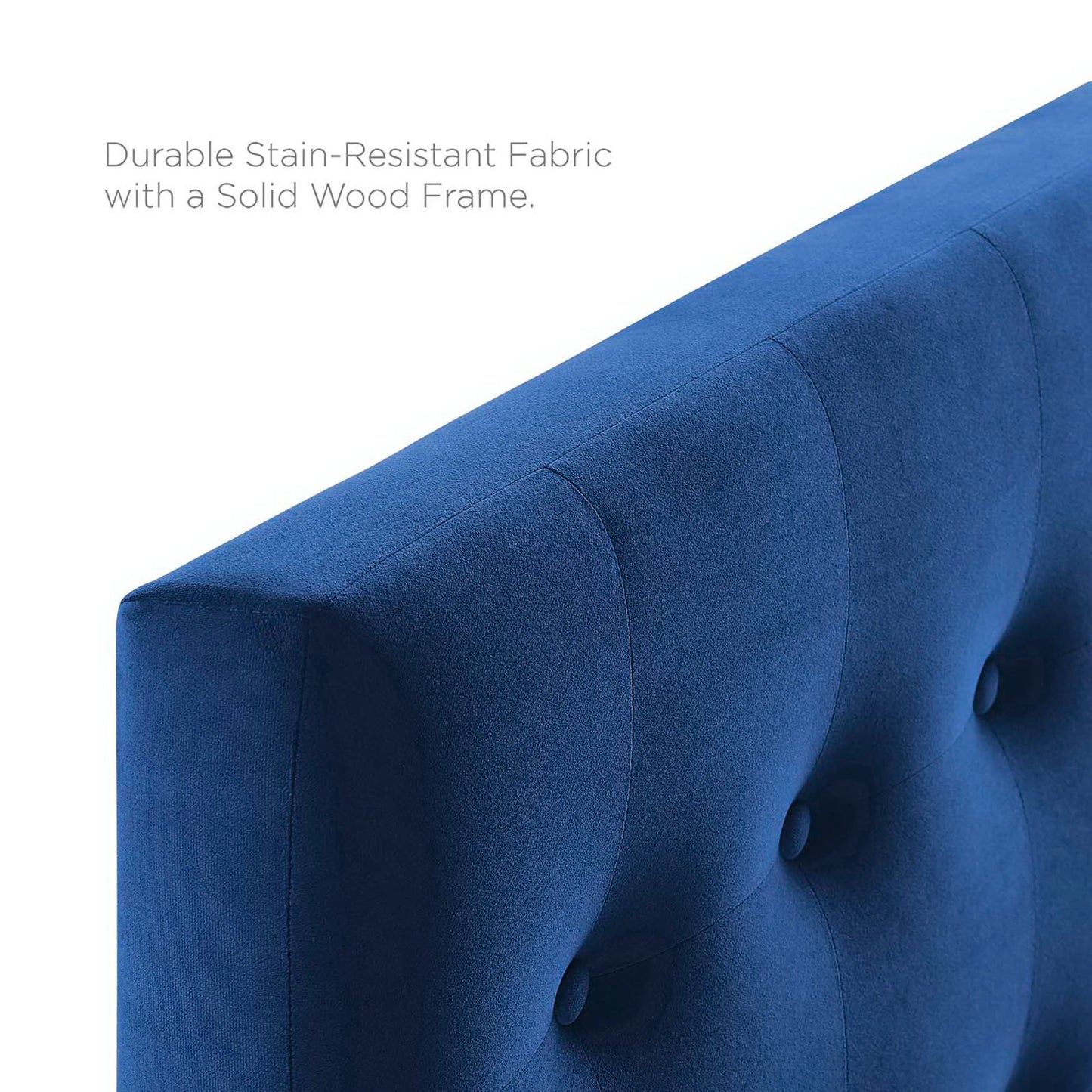 Navy blue biscuit-tufted velvet twin headboard.