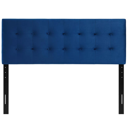 Navy blue tufted upholstered headboard with square button tufting, mounted on black metal legs.