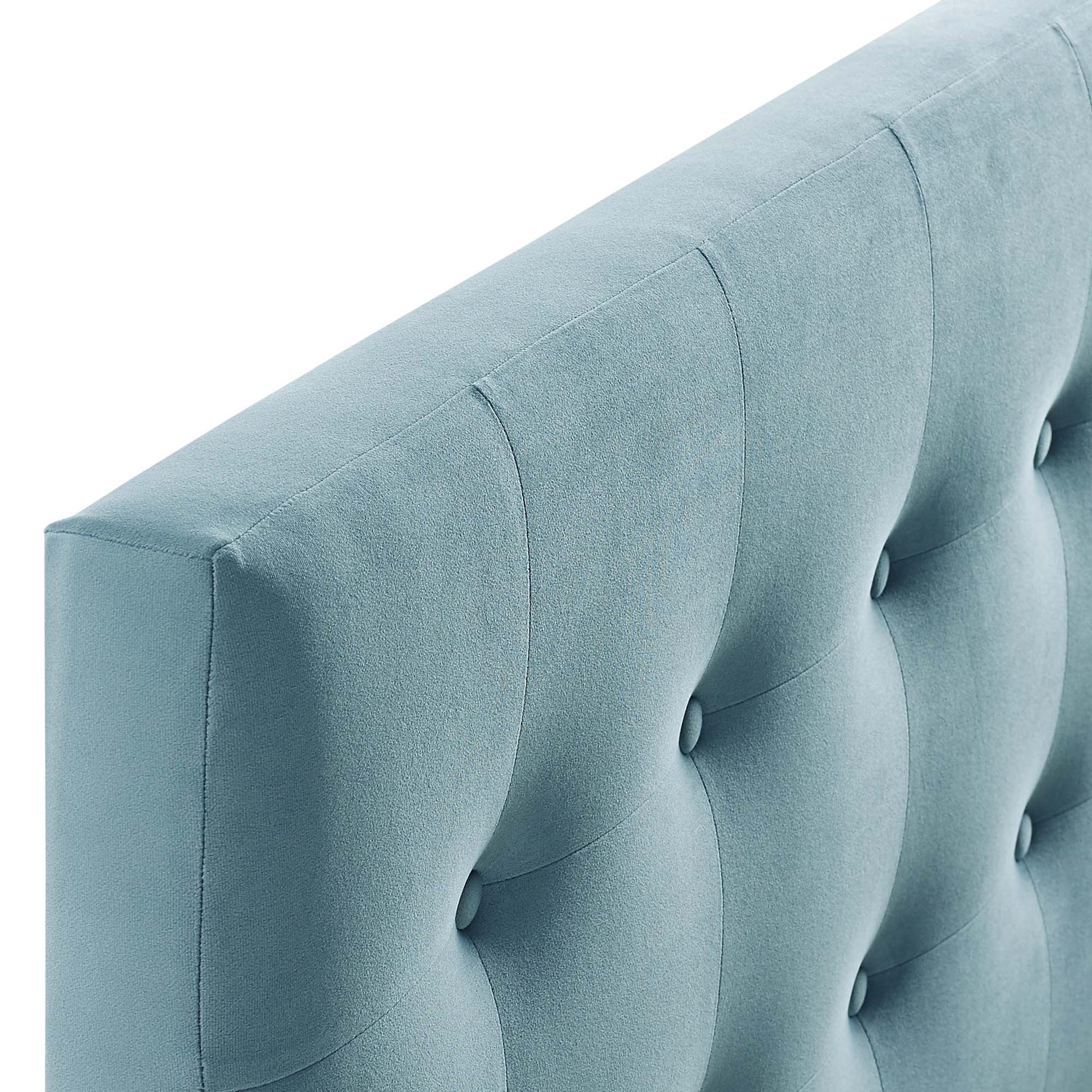 Light blue biscuit-tufted velvet queen headboard with vertical channels and button accents.