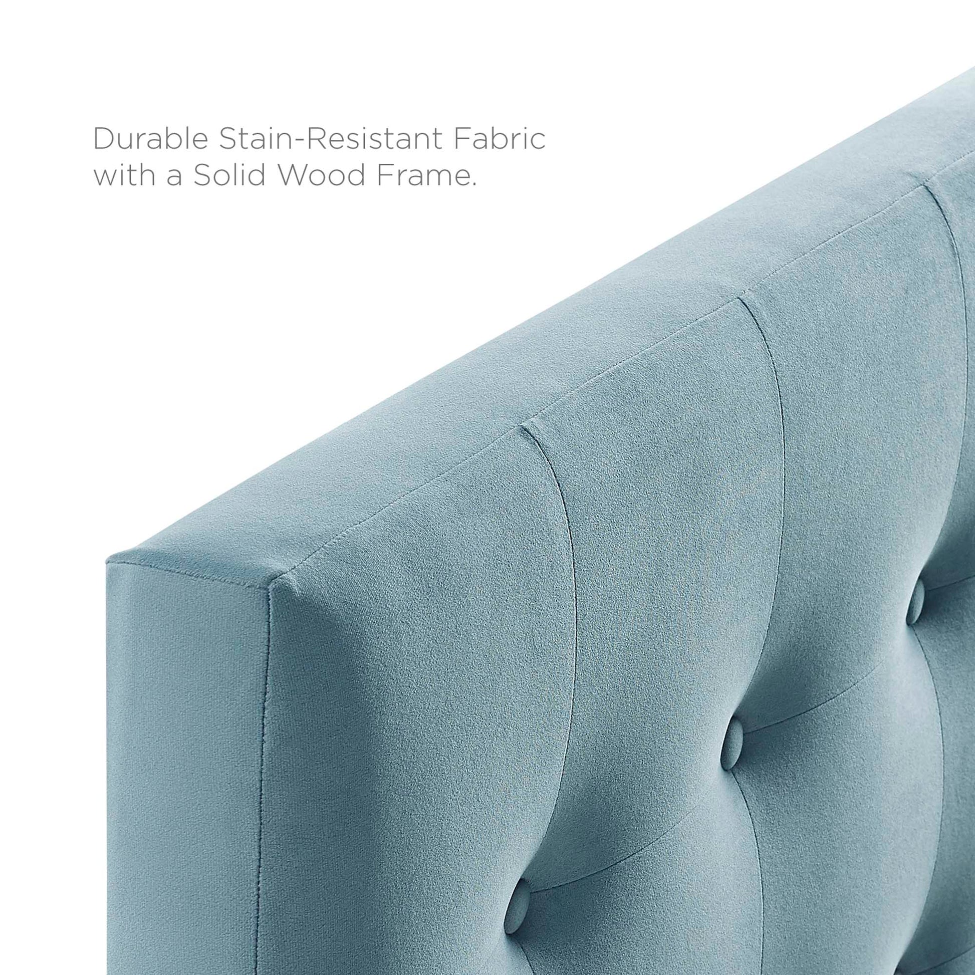 Light blue, stain-resistant performance velvet headboard with biscuit tufting and vertical channels.