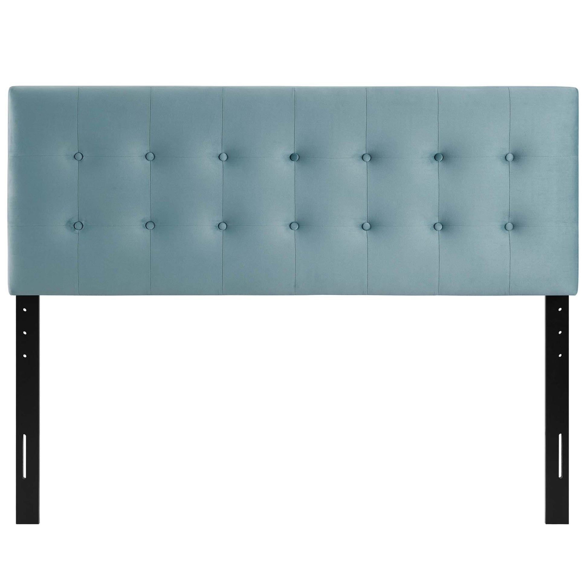Blue tufted upholstered headboard with button accents, mounted on adjustable black metal legs for a contemporary bed.