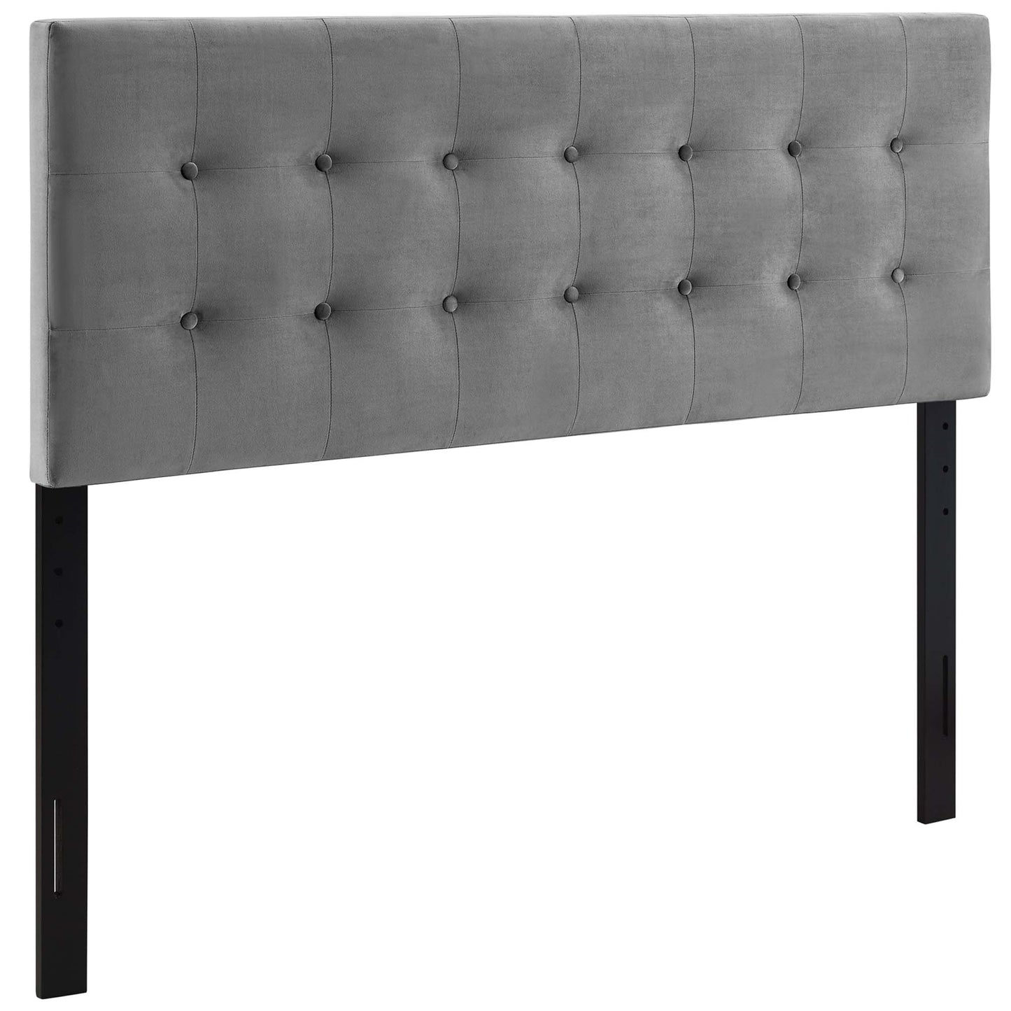 Grey tufted fabric headboard with button-grid pattern and black legs.