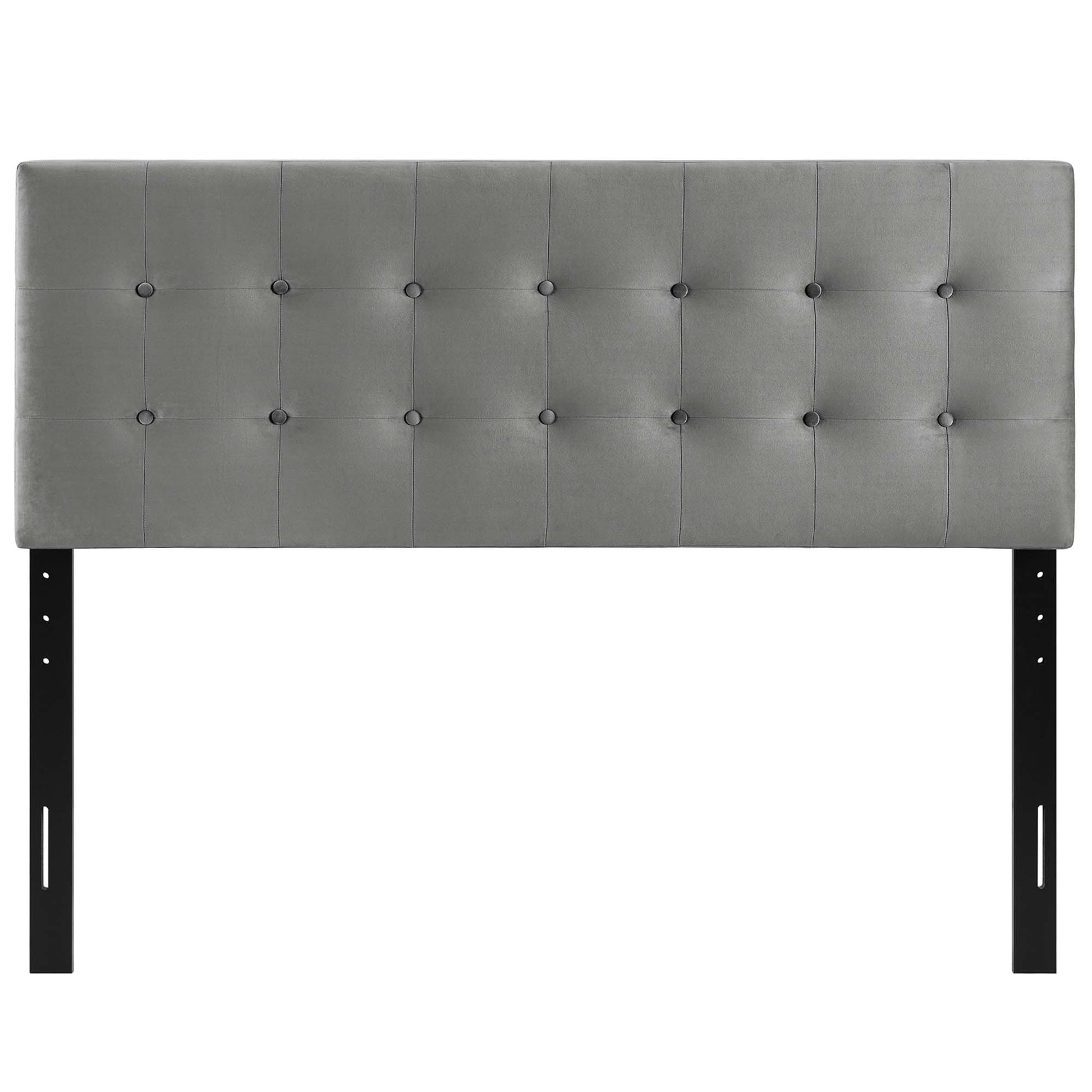 Gray tufted upholstered headboard with a rectangular panel and button grid, supported by black metal legs.