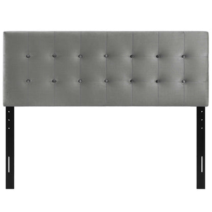 Gray tufted upholstered headboard with a rectangular panel and button grid, supported by black metal legs.