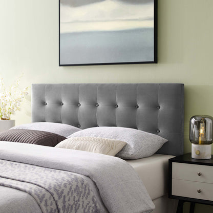Grey biscuit tufted performance velvet king headboard with light grey bedding.