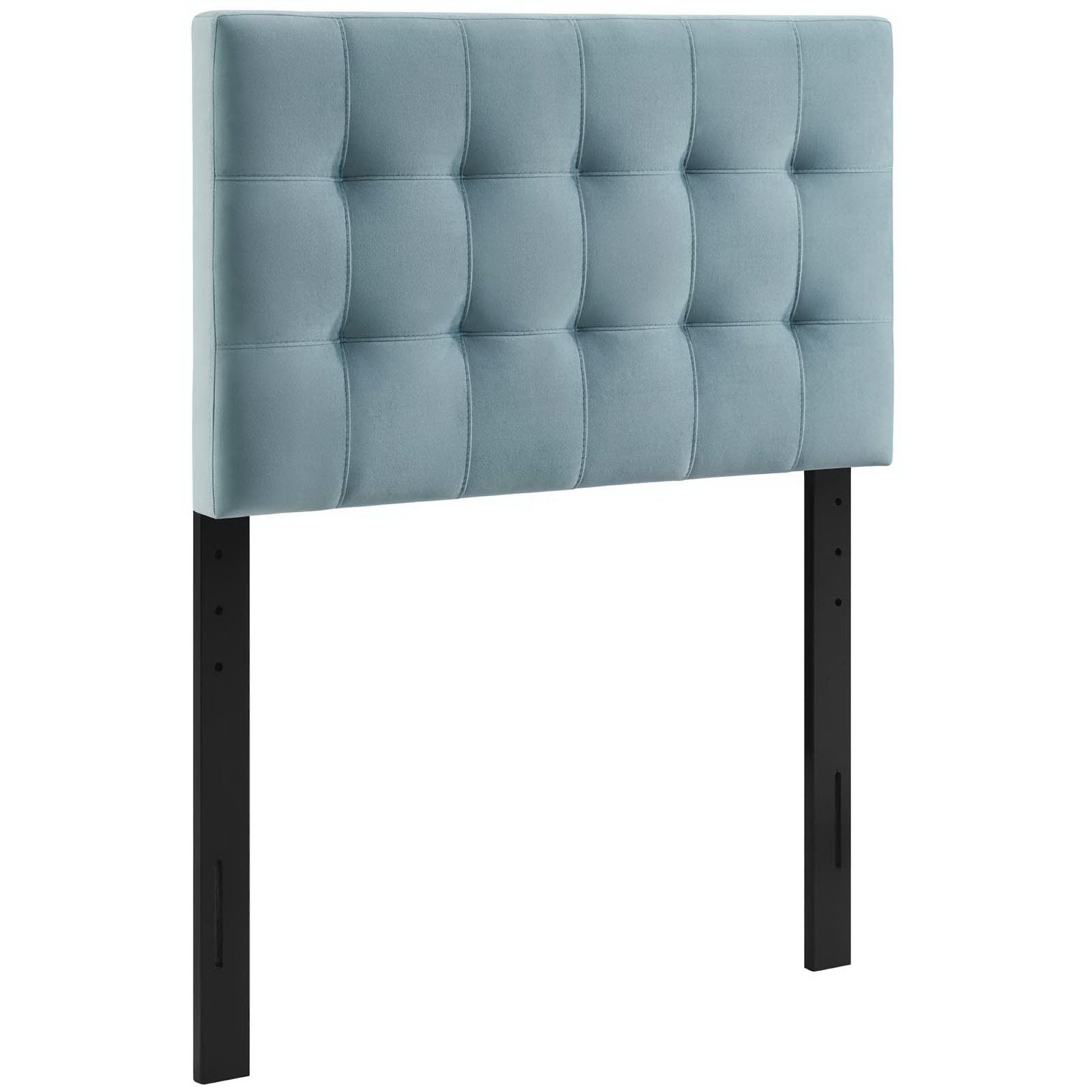 Light blue tufted fabric headboard with square panels, mounted on black metal posts.