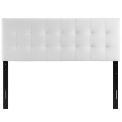 White velvet tufted headboard with square panels and black metal legs.