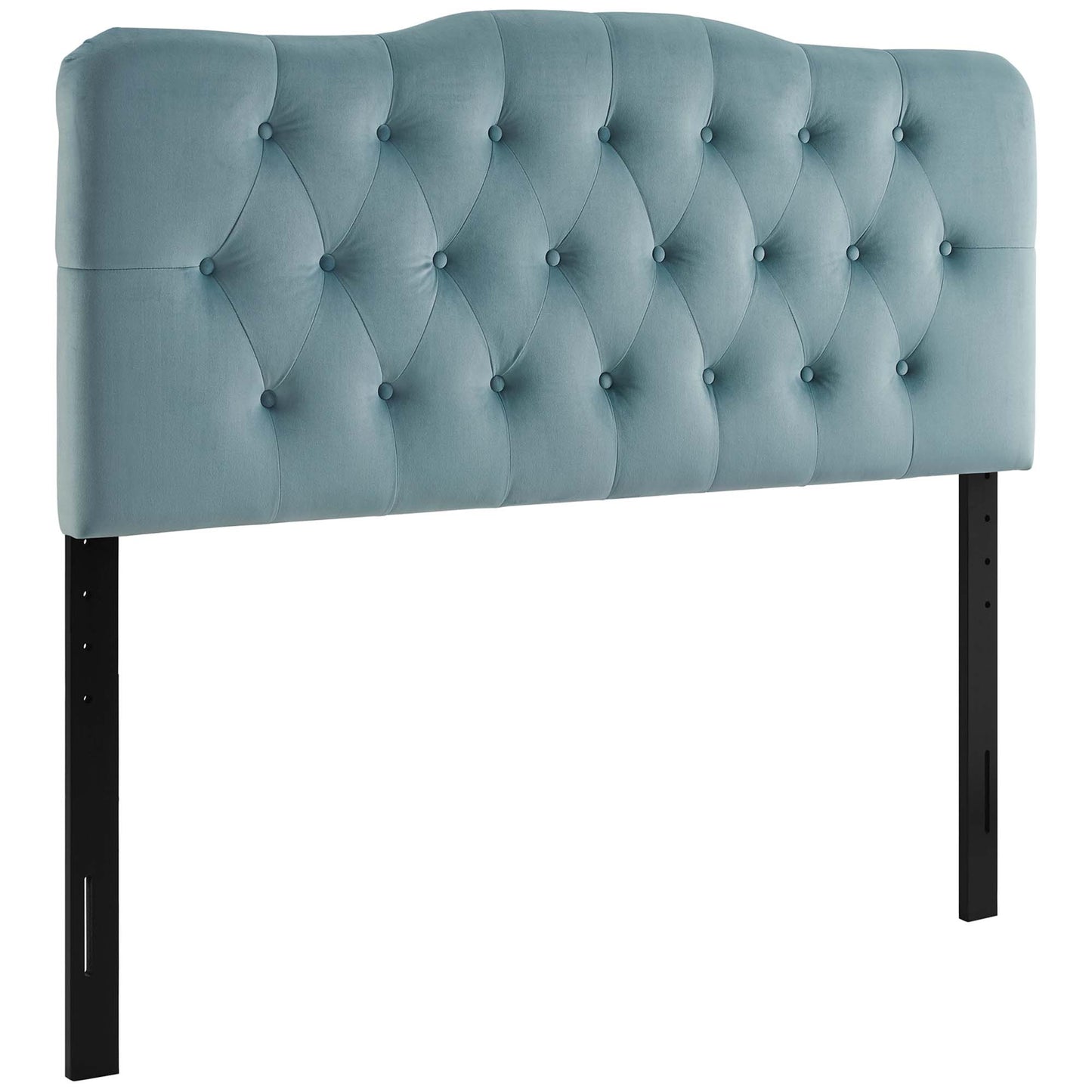 Blue velvet queen headboard with diamond button tufting and black metal legs.