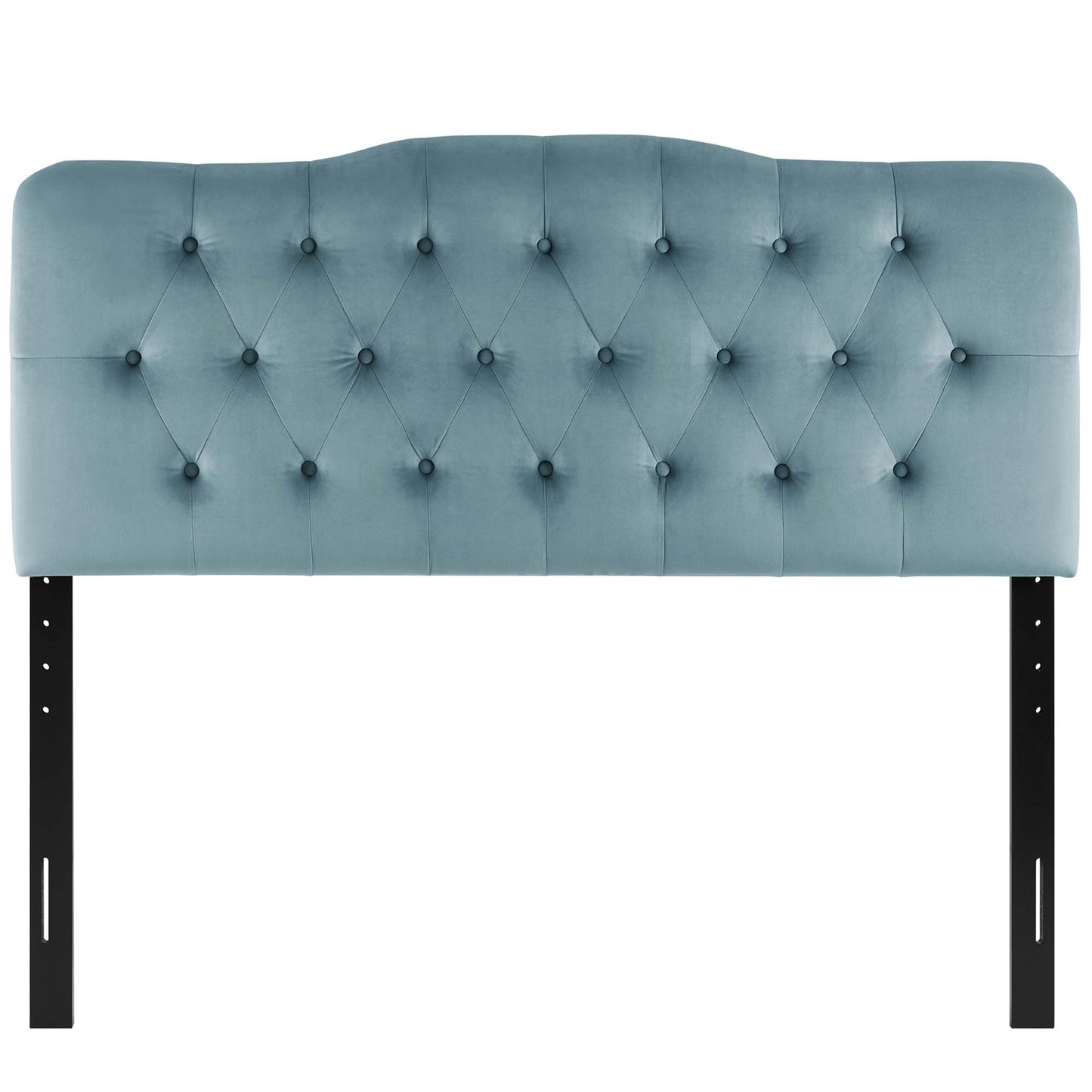 Blue velvet tufted headboard with diamond button pattern and curved top, supported by black metal legs.
