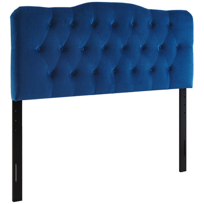 Navy blue tufted velvet headboard with button-tufted detail and black metal legs.