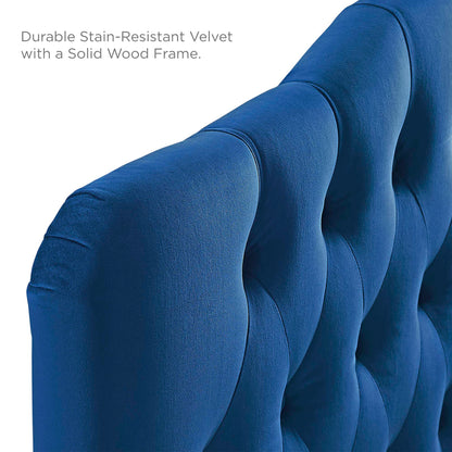 Deep navy blue velvet headboard with diamond tufting on a solid wood frame; modern bedroom headboard.