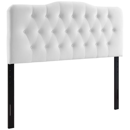 White tufted upholstered headboard with diamond buttons, curved top and black metal legs.