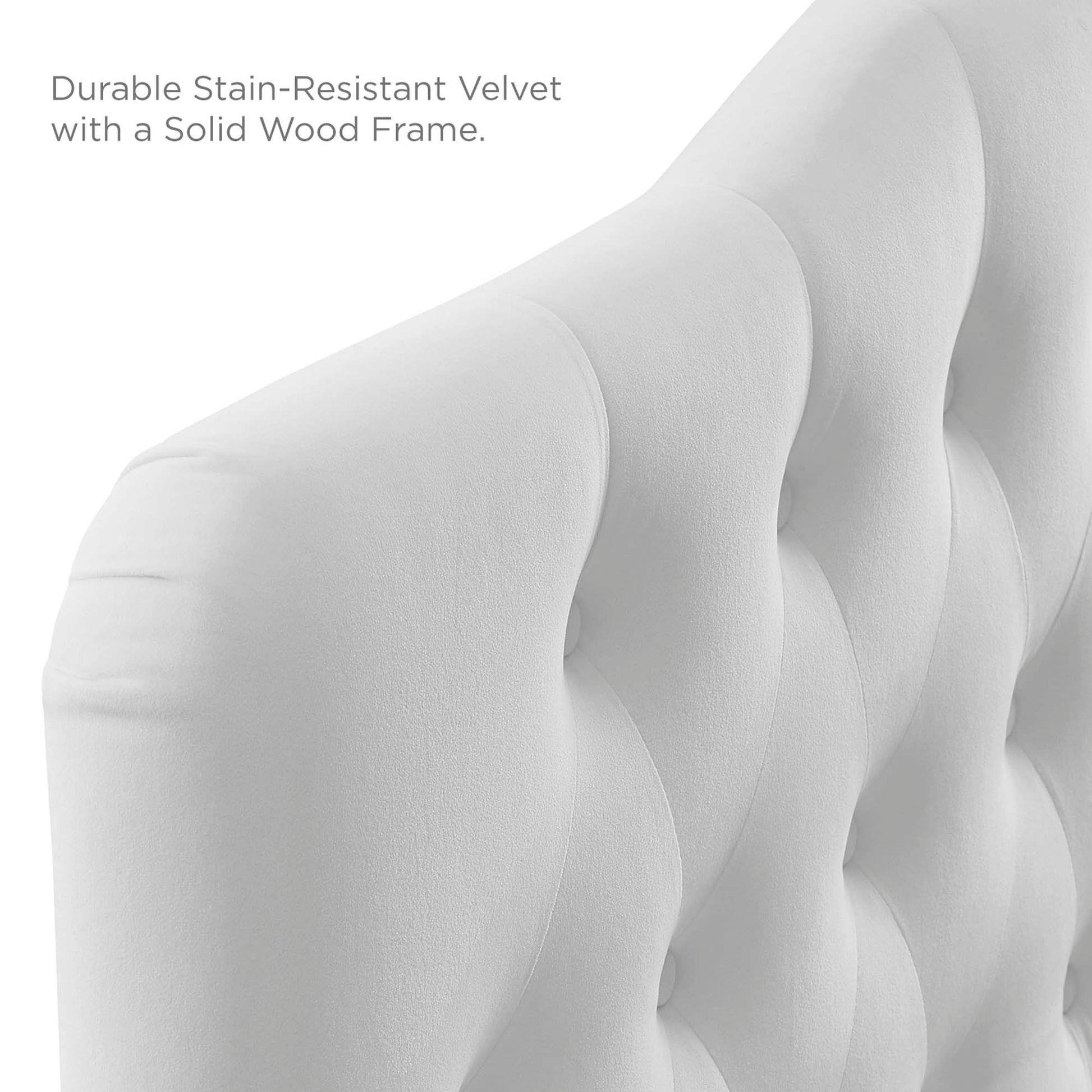 White velvet tufted headboard with diamond tufting, curved panels and deep button tufts.