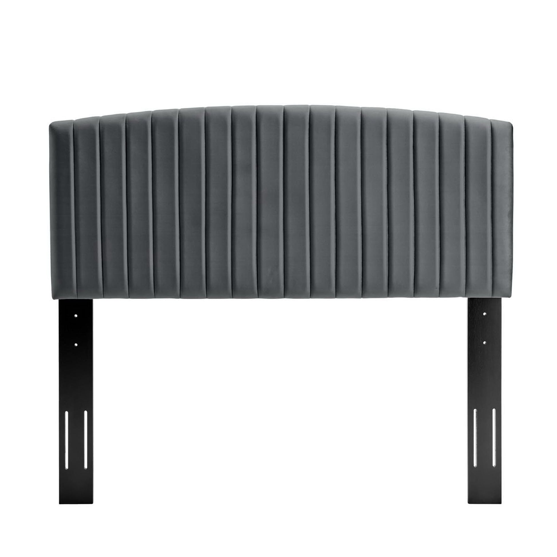 Dark gray velvet upholstered headboard with vertical channel tufting & black metal legs.